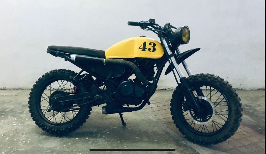Custom yellow scrambler motorcycle built for the Telugu film Rowdy Boys